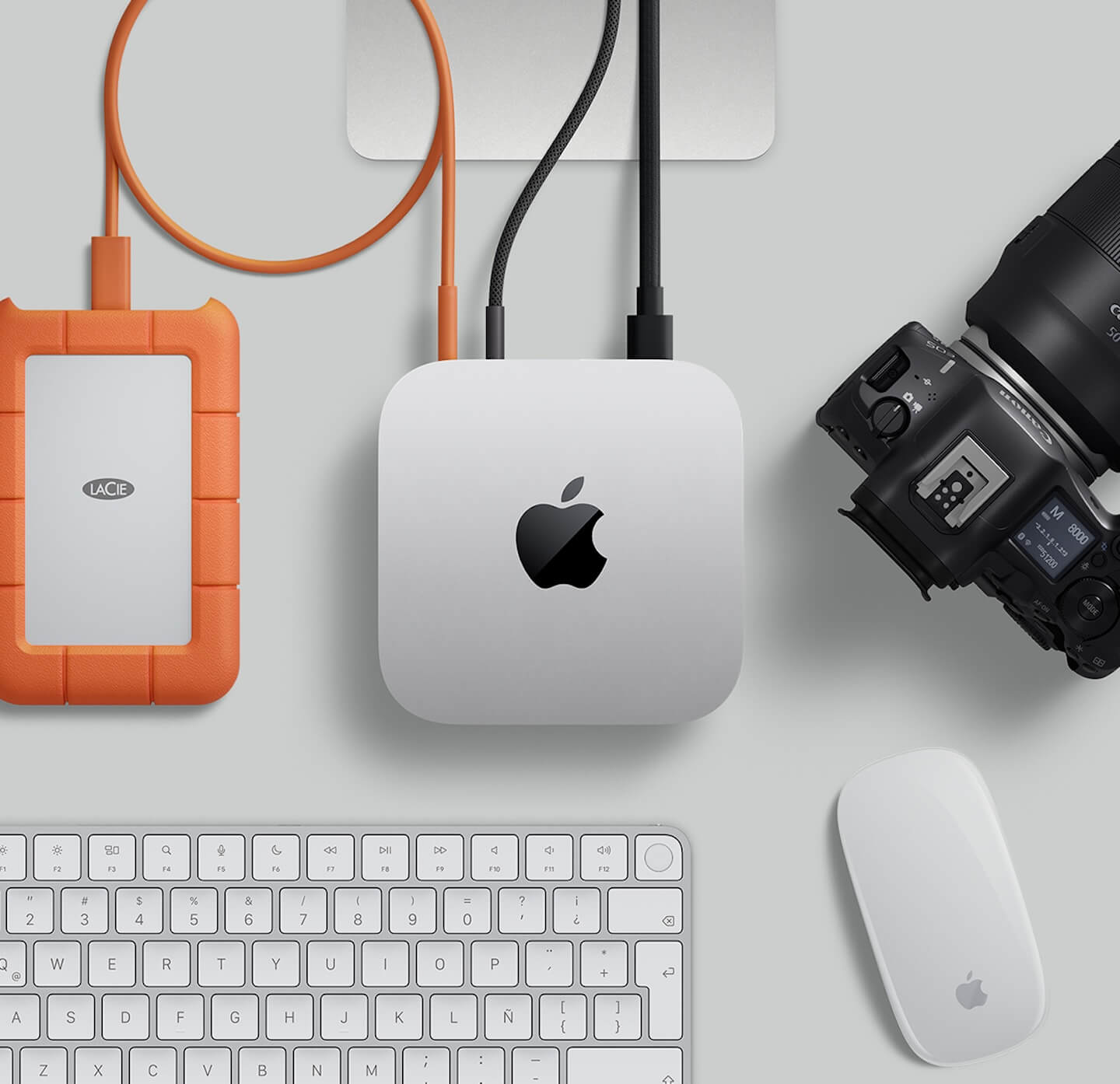 M4 Mac Mini with a photo editing workflow including an external drive and camera