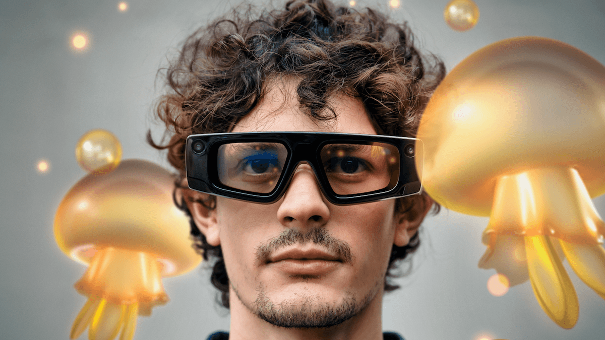 Man with spectacles with virtual objects around him